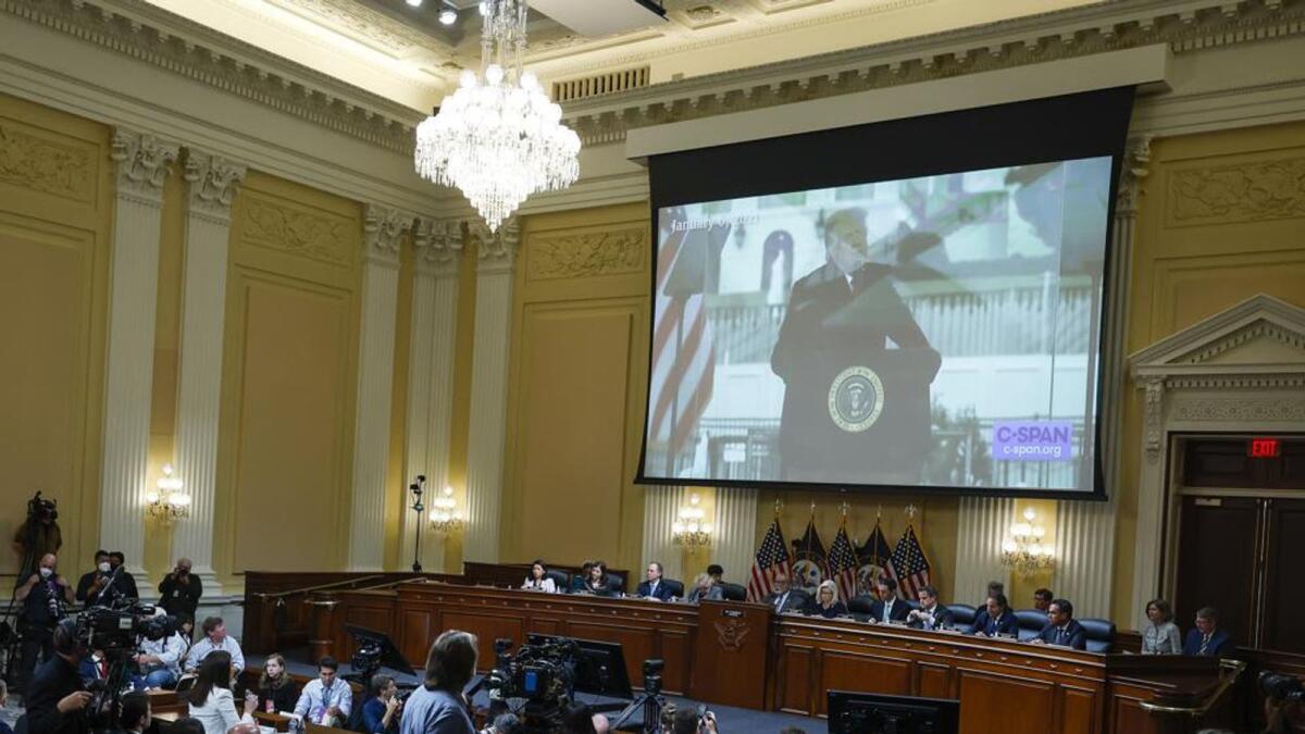 A image of former President Donald Trump is displayed as Cassidy Hutchinson, former aide to Trump White House chief of staff Mark Meadows, testifies. Photo: AP
