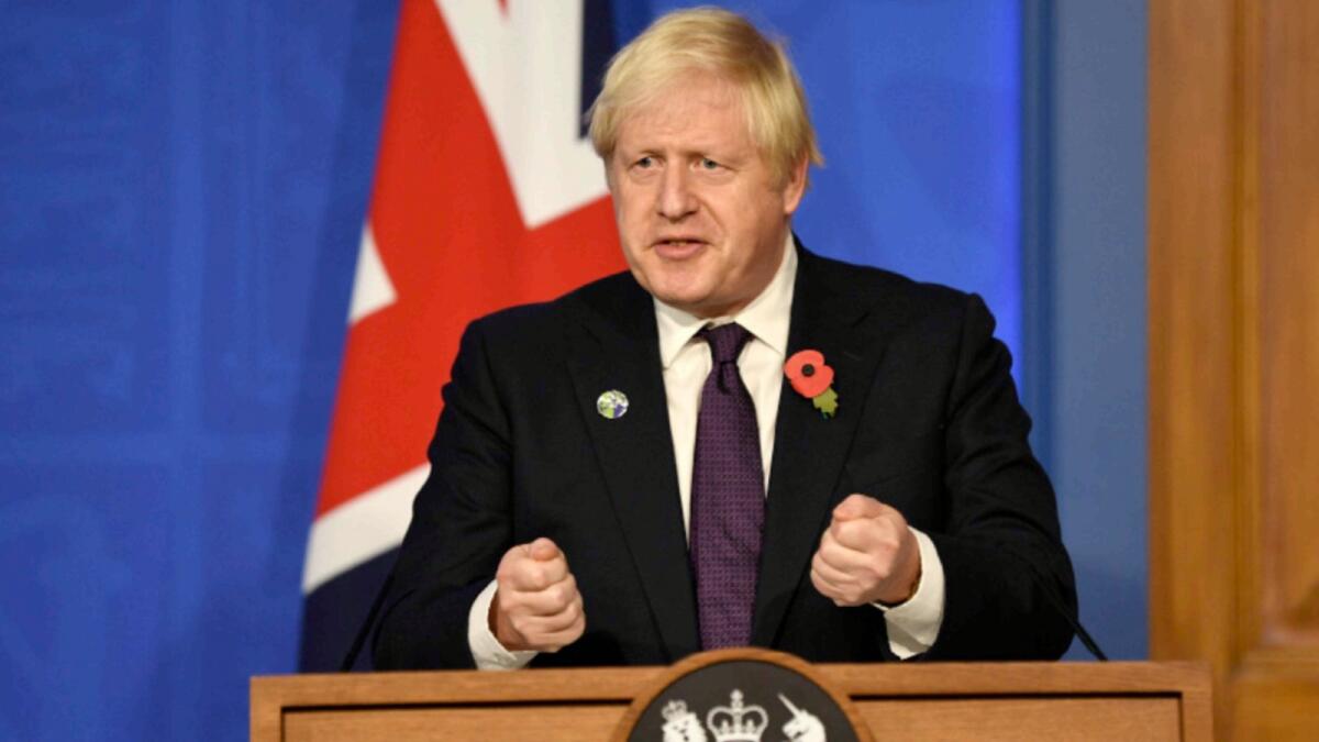 British Prime Minister Boris Johnson speaks at a Press conference. — AP