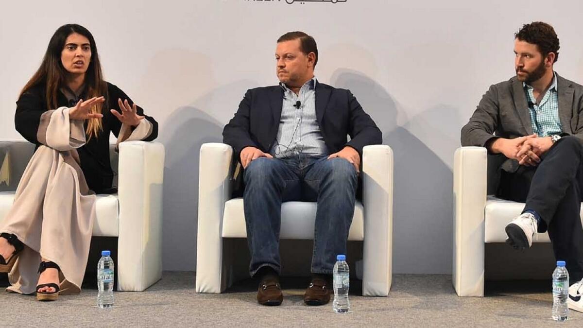Dr Saeeda Jaffar; Christos Mastoras; and Sam Hodges, co-founder and chairman of Funding Circles, participate in a panel discussion in Abu Dhabi.