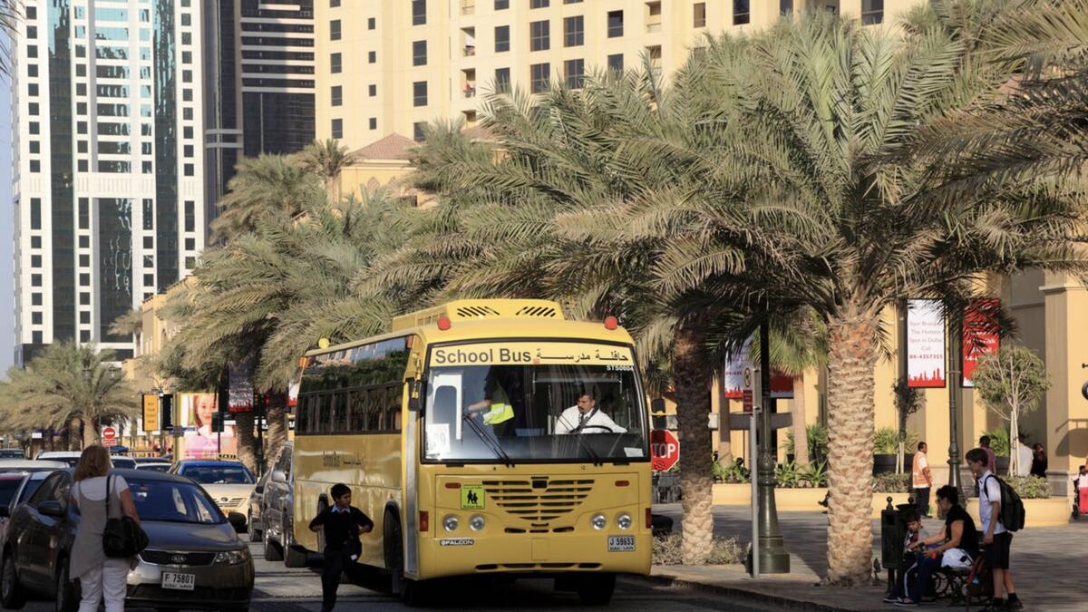 School buses, UAE, tracking system, smart alert systems, remote cameras