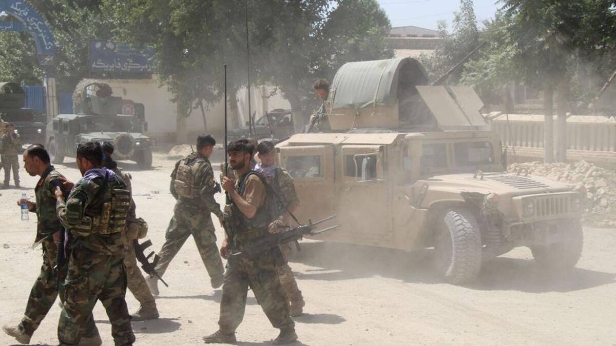 Afghan forces seen at the site of a battle field in Kunduz province, Afghanistan. Photo: Reuters