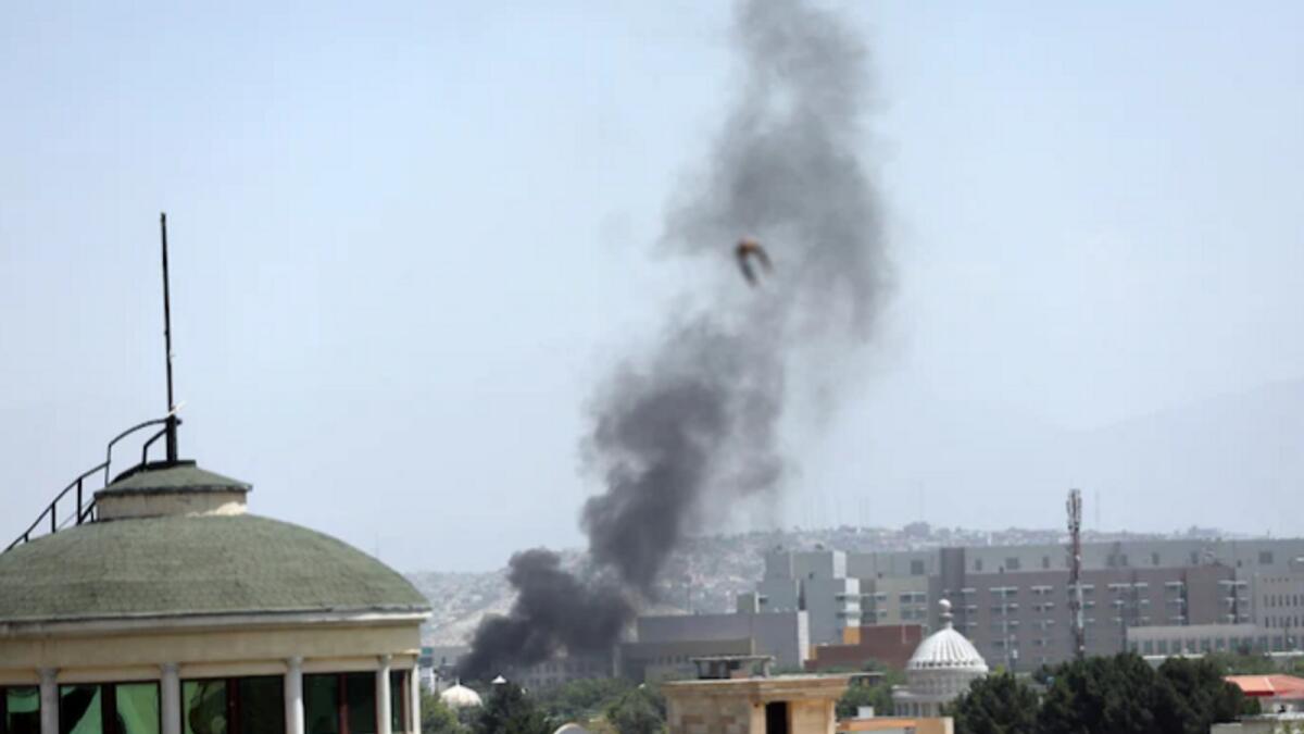 Smoke rises next to the US Embassy in Kabul. Photo: AP