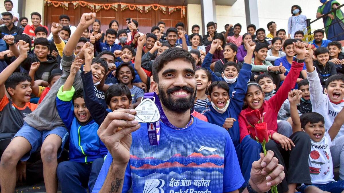 Kidambi Srikanth celebrates his BWF World Championships silver medal with young badminton players at Pullela Gopichand Badminton Academy in Hyderabad. (PTI)