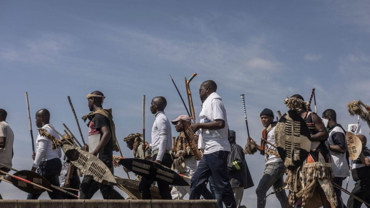 Mourners arrive ahead of the Zulu prince Mangosuthu Buthelezi's funeral proceedings in Ulundi. — AFP