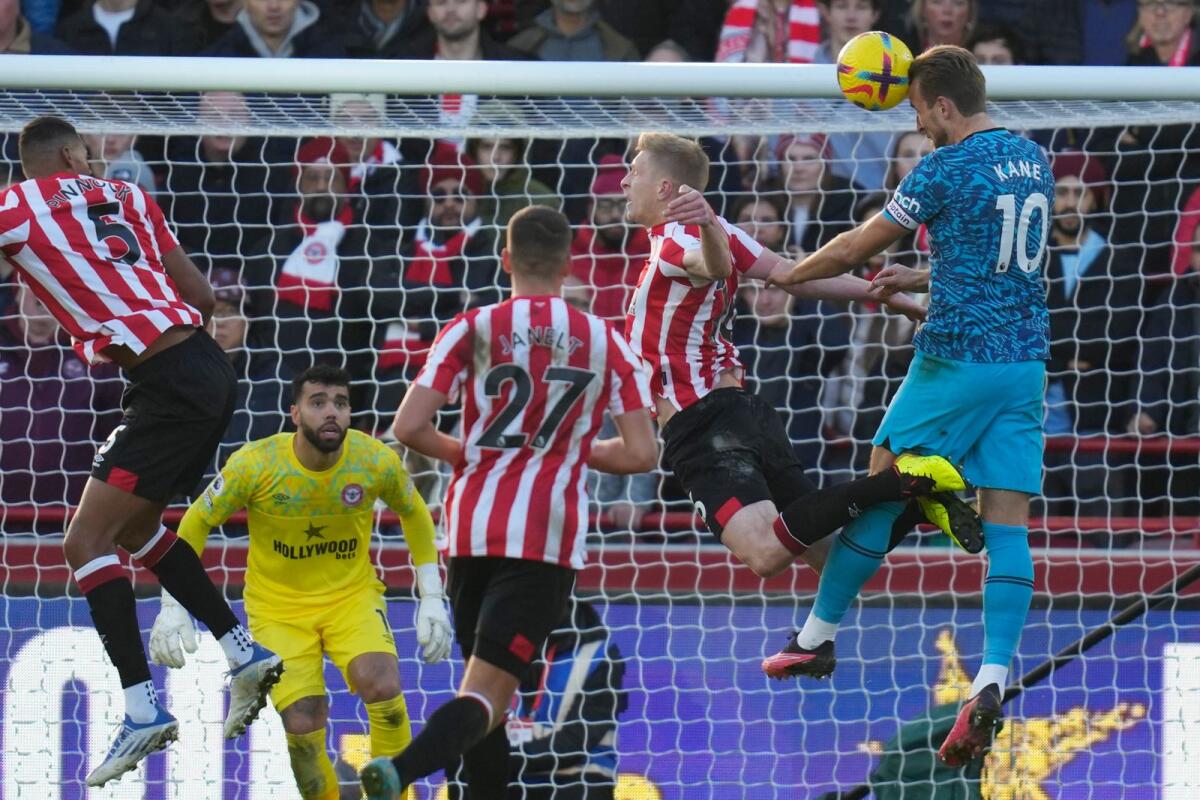 Tottenham's Harry Kane (right) scores his side's first goal during the English Premier League match against Brentford. — AP