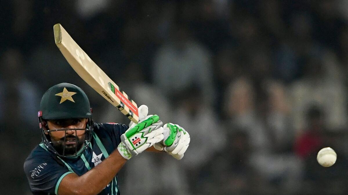 Pakistan captain Babar Azam plays a shot during the sixth T20 International against England at the Gaddafi Cricket Stadium in Lahore on Friday. — AFP