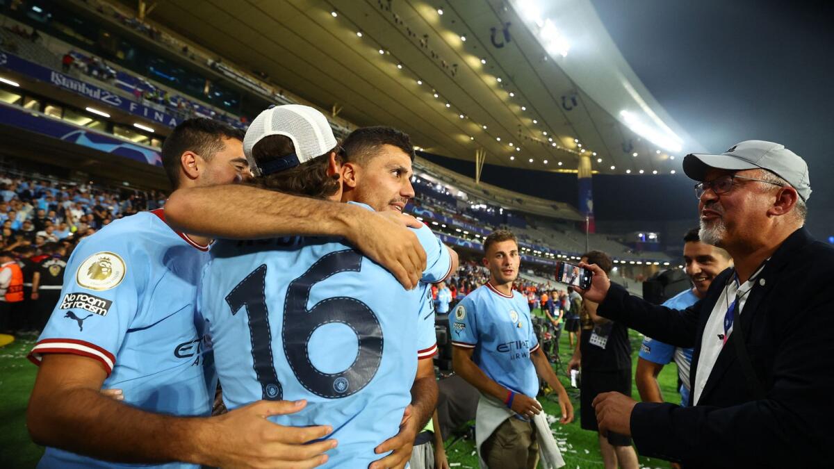 Manchester City's Rodri celebrates after winning the Champions League.