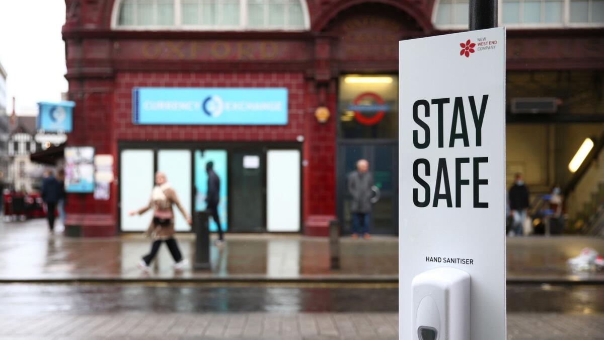 A hand sanitiser dispenser for combating the spread of the Covid-19 virus is pictured on Oxford Street in London. – AFP