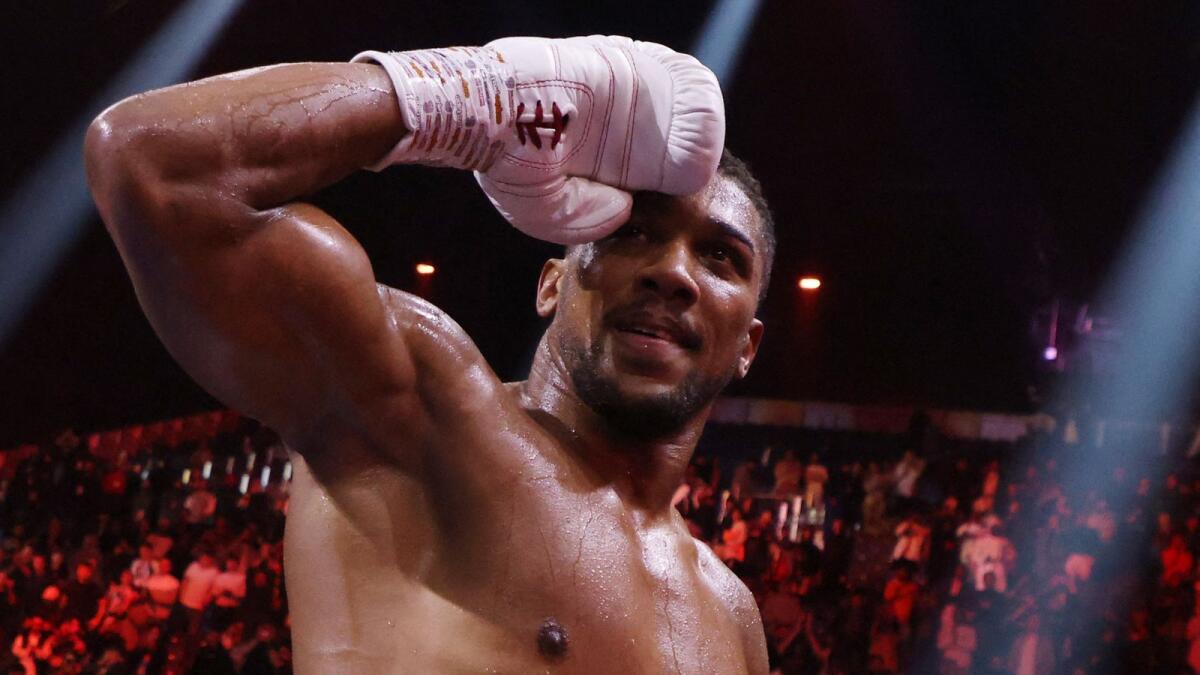 Anthony Joshua celebrates after winning his fight against Otto Wallin. - Reuters