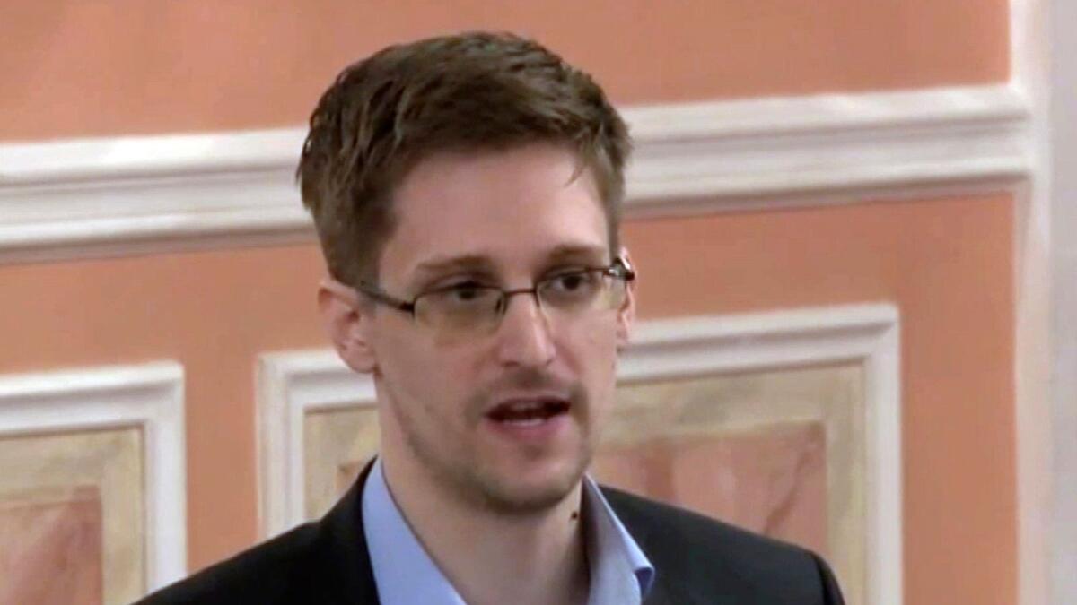 Edward Snowden speaks in Moscow in 2013. – AP file
