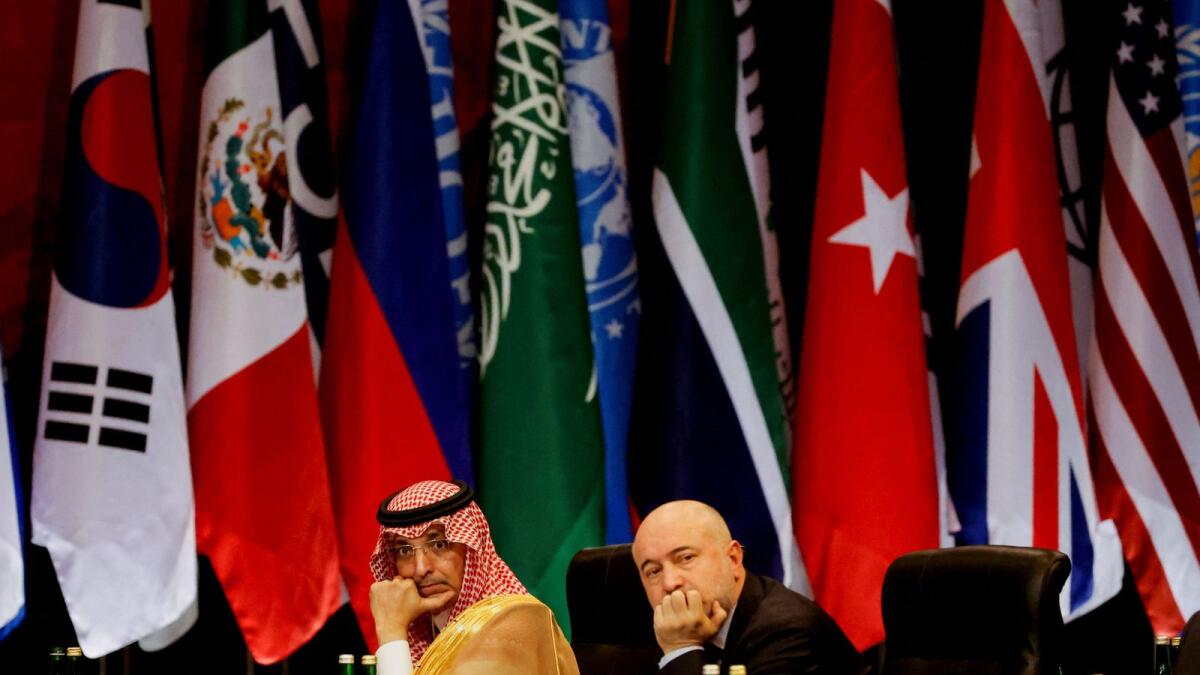 Saudi Arabia's Finance Minister Mohammed bin Abdullah Al Jadaan and a delegate from Turkey attend a session during the G20 Leaders' Summit, in Nusa Dua, Bali, Indonesia, on November 16, 2022. — Reuters
