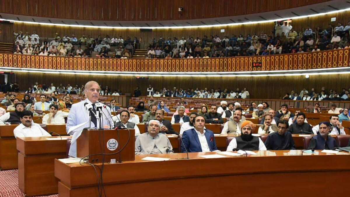 Pakistan's newly elected Prime Minister Shehbaz Sharif (L) addressing the National Assembly in Islamabad. Photo: AFP