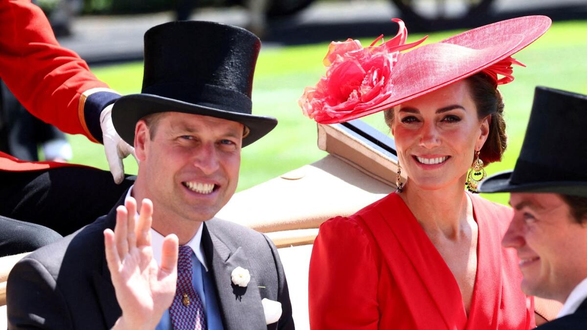 Britain's Prince William and Catherine, Princess of Wales are pictured during the royal procession ahead of the Horse Racing. -- Reuters file