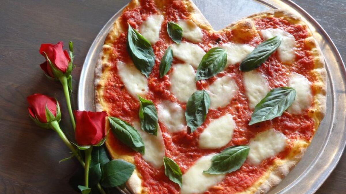 Don’t want to go over the top this Valentine’s Day? Pizza and chill. But you’ve got to at least gift a rose. Freedom Pizza has got you covered. On the menu until Saturday is the beautiful Freedom Rose and chocolate covered marshmallows along with their delicious range of pizzas.