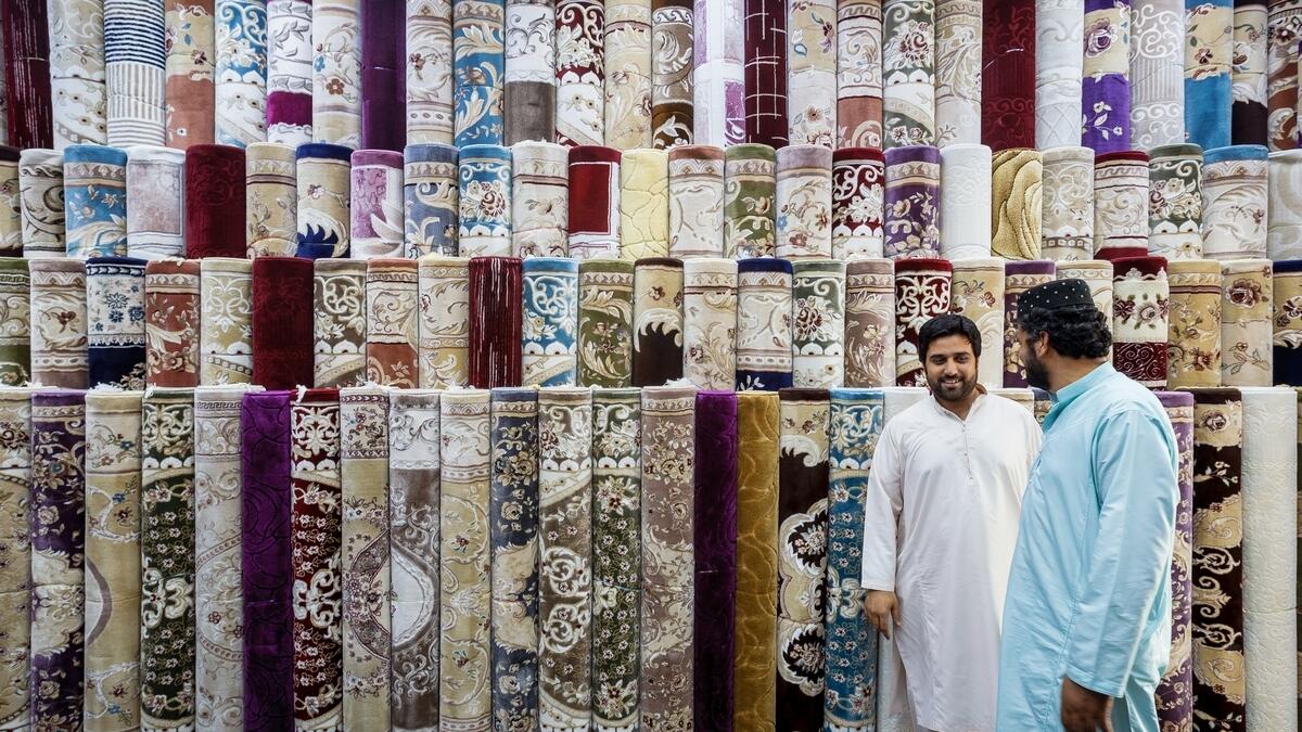 PATTERNS THAT MATTER... Abu Dhabi’s Carpet Souk dazzle any passerby with its vibrant colours, patterns and materials