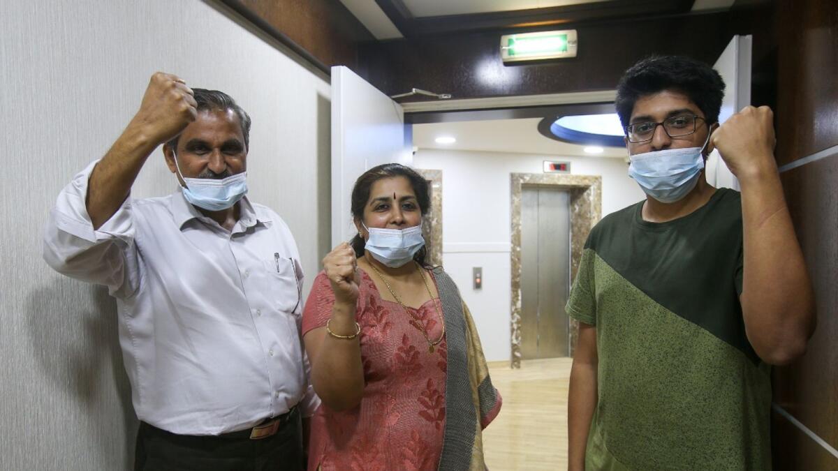 An Indian family is elated after getting the Covid-19 vaccine in Abu Dhabi. — Photo: Ryan Lim