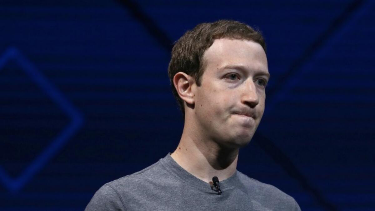 Zuckerberg apologizes for Facebook mistakes, vows curbs