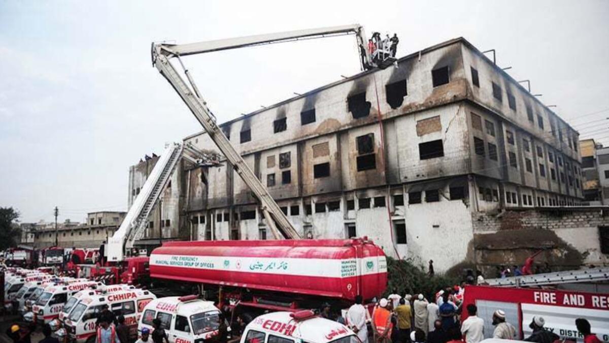 Pakistan factory fire, 260 killed in factory fire, karachi, arson, garments factory