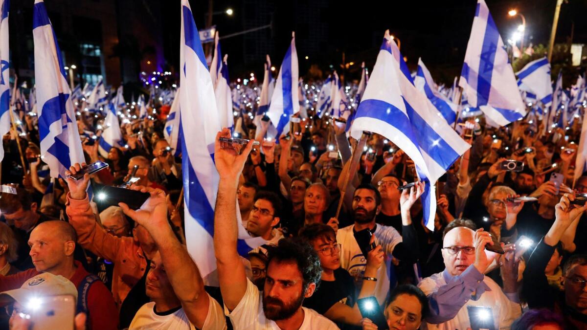 People demonstrate in Tel Aviv on Saturday against Israeli Prime Minister Benjamin Netanyahu and his nationalist coalition government's judicial overhaul. — Reuters
