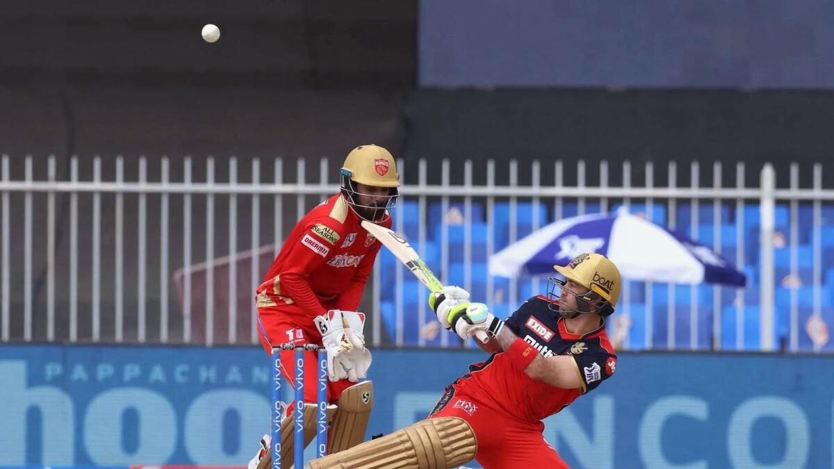 Royal Challengers Bangalore’s Glenn Maxwell plays a shot against the Punjab Kings in Sharjah on Sunday. —BCCI