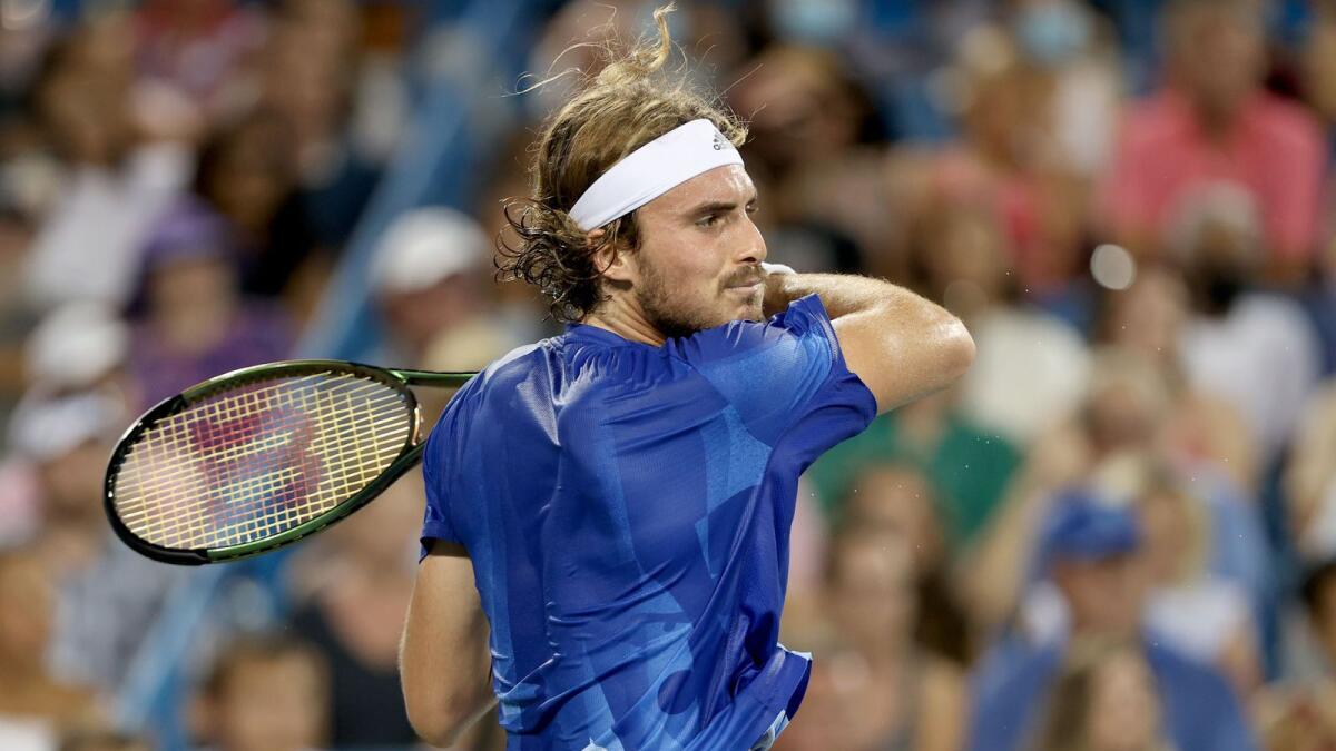 Stefanos Tsitsipas plays a return shot to Alexander Zverev during the semifinals of the Western &amp; Southern Open in Mason, Ohio. — AFP