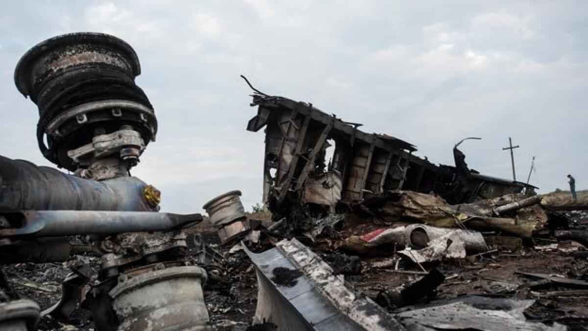 Work starts in Ukraine to collect wreckage of MH17
