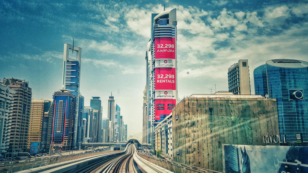 High rise buildings in Dubai seem to touch the Sky. A view of the Sheikh Zayed road while travelling in Dubai Metro.-  Photo by Mohammed Mustafa Khan/Khaleej Times