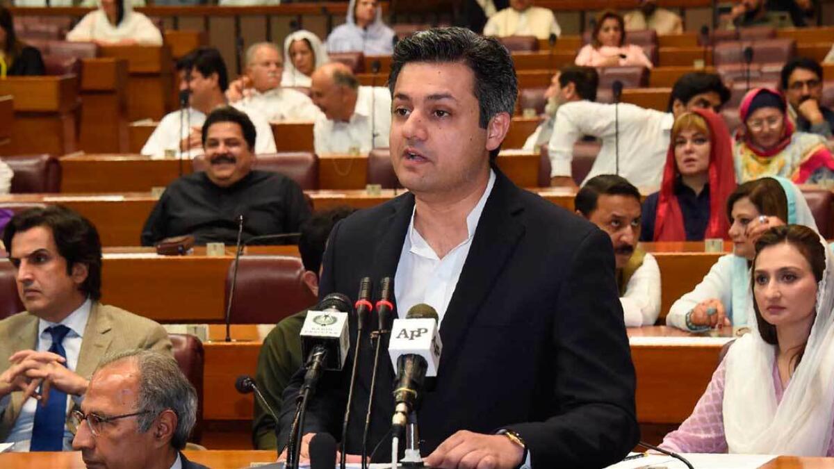 Hammad Azhar speaks as he presents the budget for the year 2019-20 in the National Assembly in Islamabad. — AFP