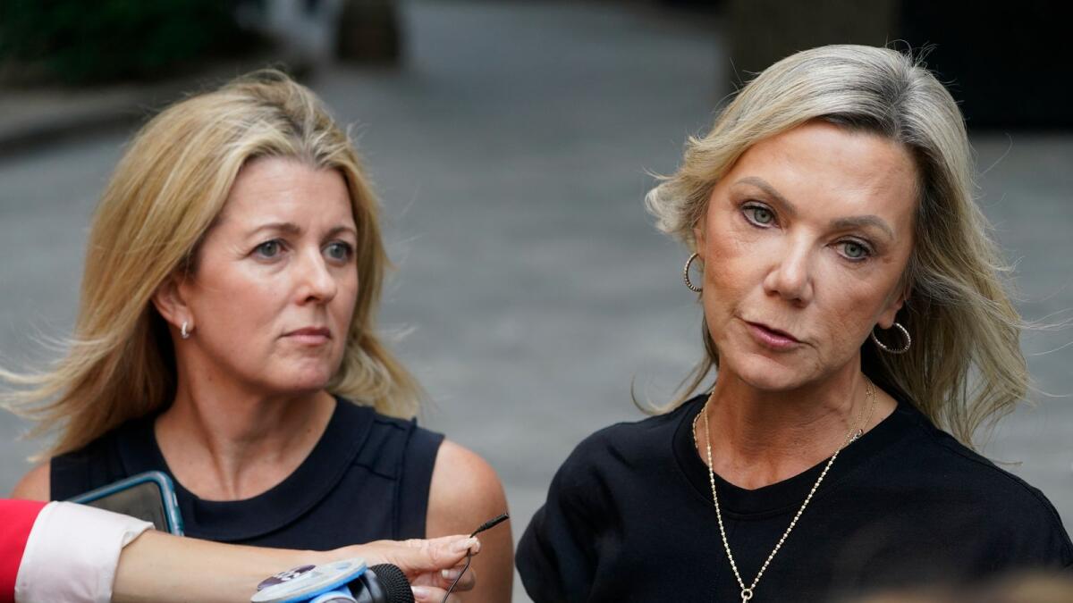 Sexual assault survivors Amy Yoney, right, and Laurie Kanyok, left, speak to members of the media during a break in sentencing proceedings for convicted sex offender Robert Hadden outside Federal Court, on Monday. — AP