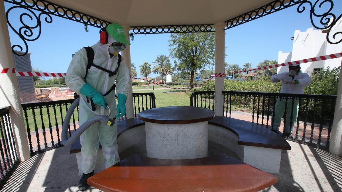 Tadweer cleaners are working to ensure public safety by sanitizing all public parks in Abu Dhabi.