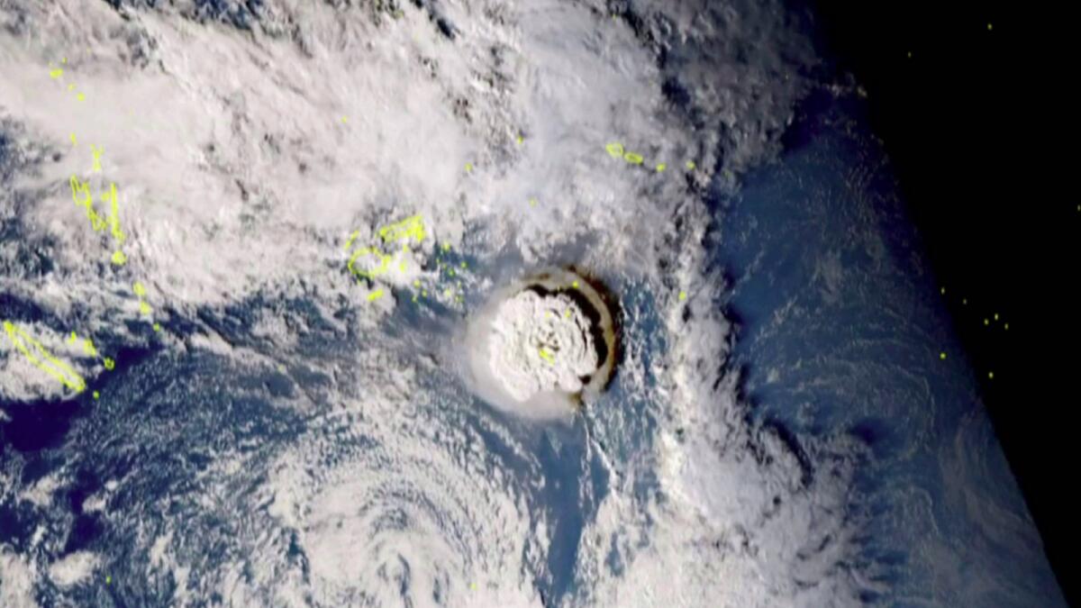 A grab taken from footage by Japan's Himawari-8 satellite and released by the National Institute of Information and Communications (Japan) shows the volcanic eruption that provoked a tsunami in Tonga. — AFP