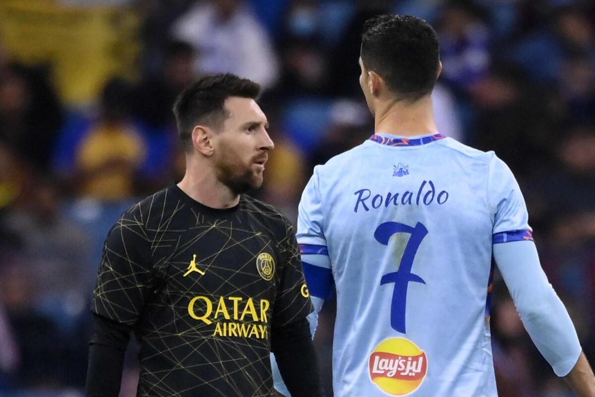 Lionel Messi (left) and Cristiano Ronaldo. — AFP