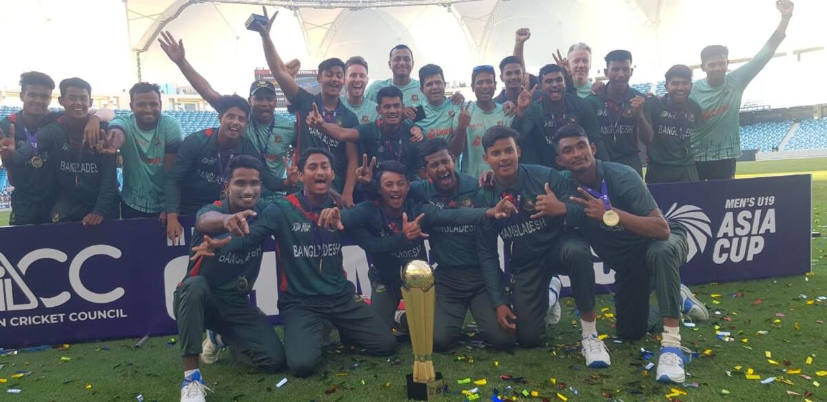 Bangladesh players celebrate with the trophy. — Photo by Rituraj Borkakoty