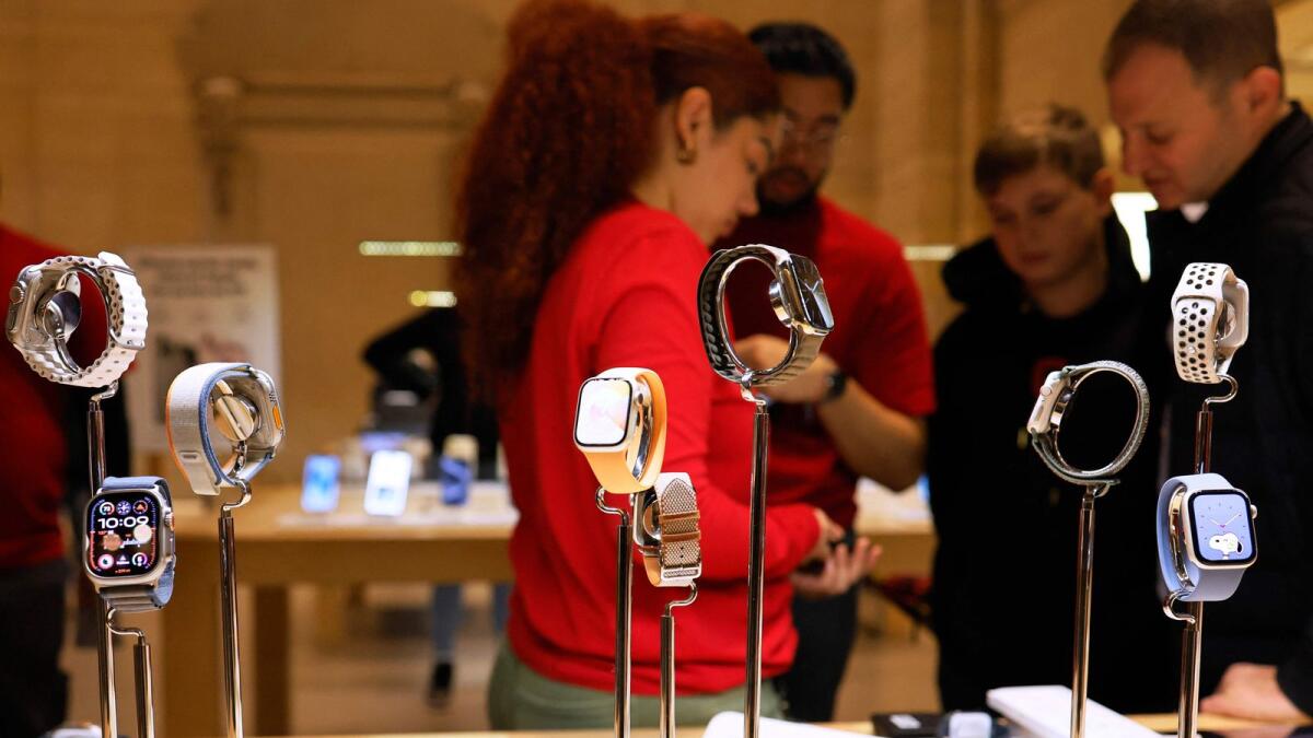 Apple watches on display at an Apple Store in New York City. Apple announced that it will halt the sale of its Apple Watch Series 9 and Apple Watch Ultra 2 in the US as early as this week. — AFP