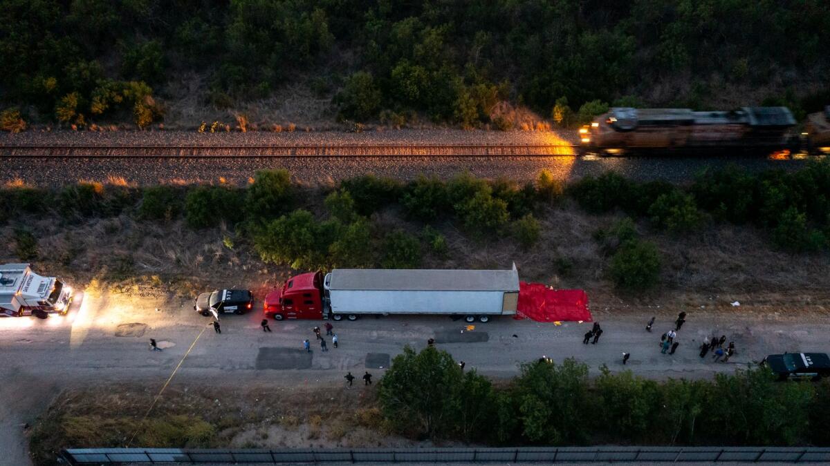 Law enforcement investigate a tractor trailer on June 27, 2022 in San Antonio, Texas. Photo: AFP