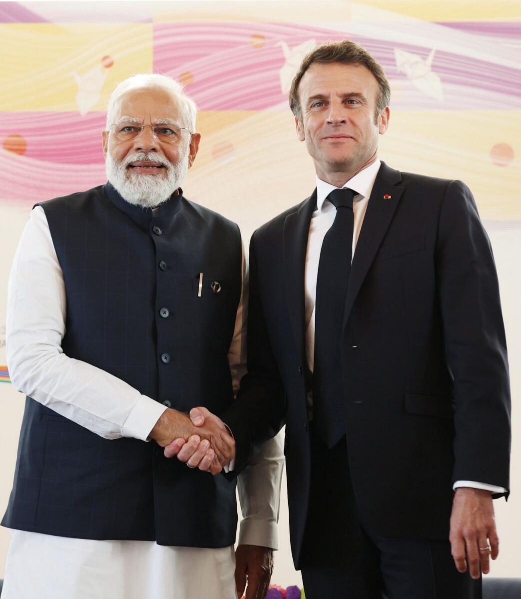 Prime Minister Narendra Modi with French President Emmanuel Macron during a meeting at the G7 Summit in Hiroshima, Japan, on Saturday. Photo: PTI