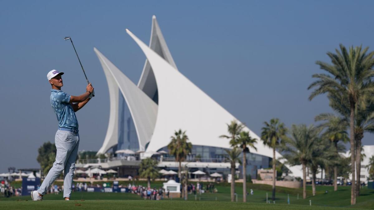 Adrian Meronk of Poland plays his second shot on the 1st hole during the Dubai Invitational golf tournament in Dubai. - AP