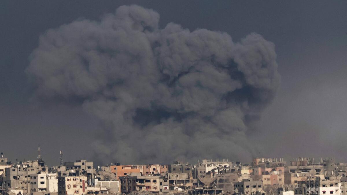 A picture taken from southern Israel near the border with the Gaza Strip shows smoke billowing during Israeli bombardment of the Palestinian territory. — AFP