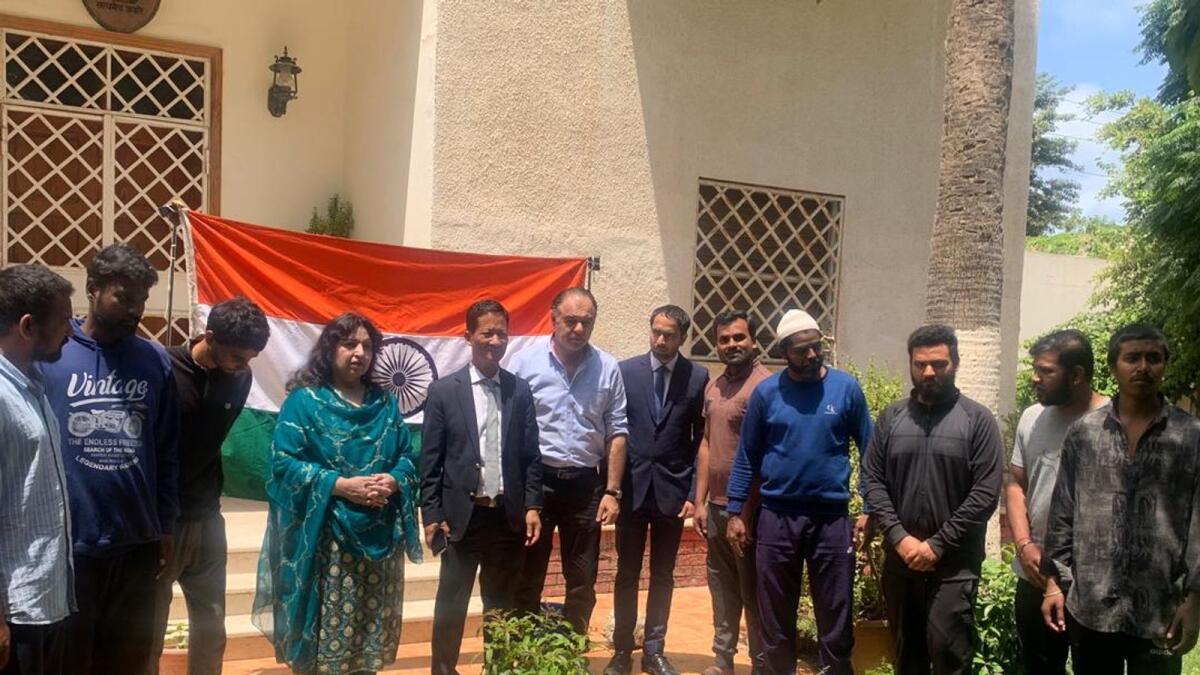 The Indian sailors released in Libya with Indian envoy to Tunisia Amb Gangte and principal of Indian School in Benghazi Tabassum Mansoor. — Photo courtesy: Twitter/The Libya Observer