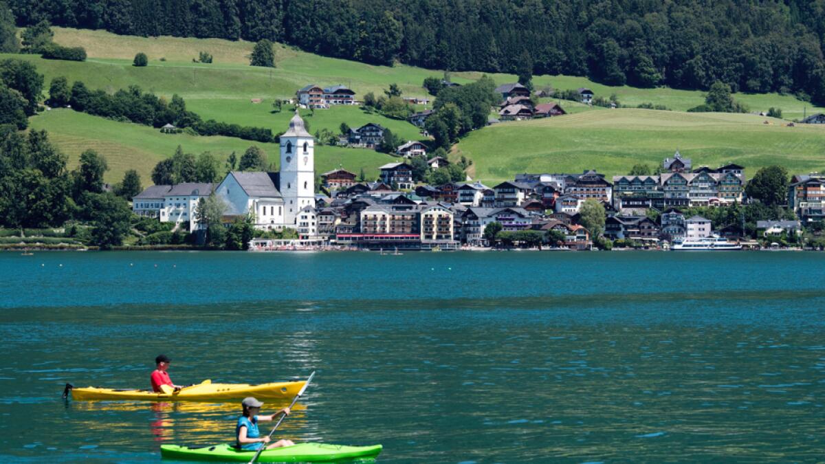 A general view over lake Wolfgangsee in St Wolfgang, Austria. More than 50 coronavirus tests in the small community of St. Wolfgang in the Salzkammergut have been positive in the past few days. Young interns in tourism companies are particularly affected, but at least one holiday guest has also been tested positive. Photo: AP&lt;br&gt;&lt;br&gt;Research: Mohammad Thanweeruddin/Khaleej Times