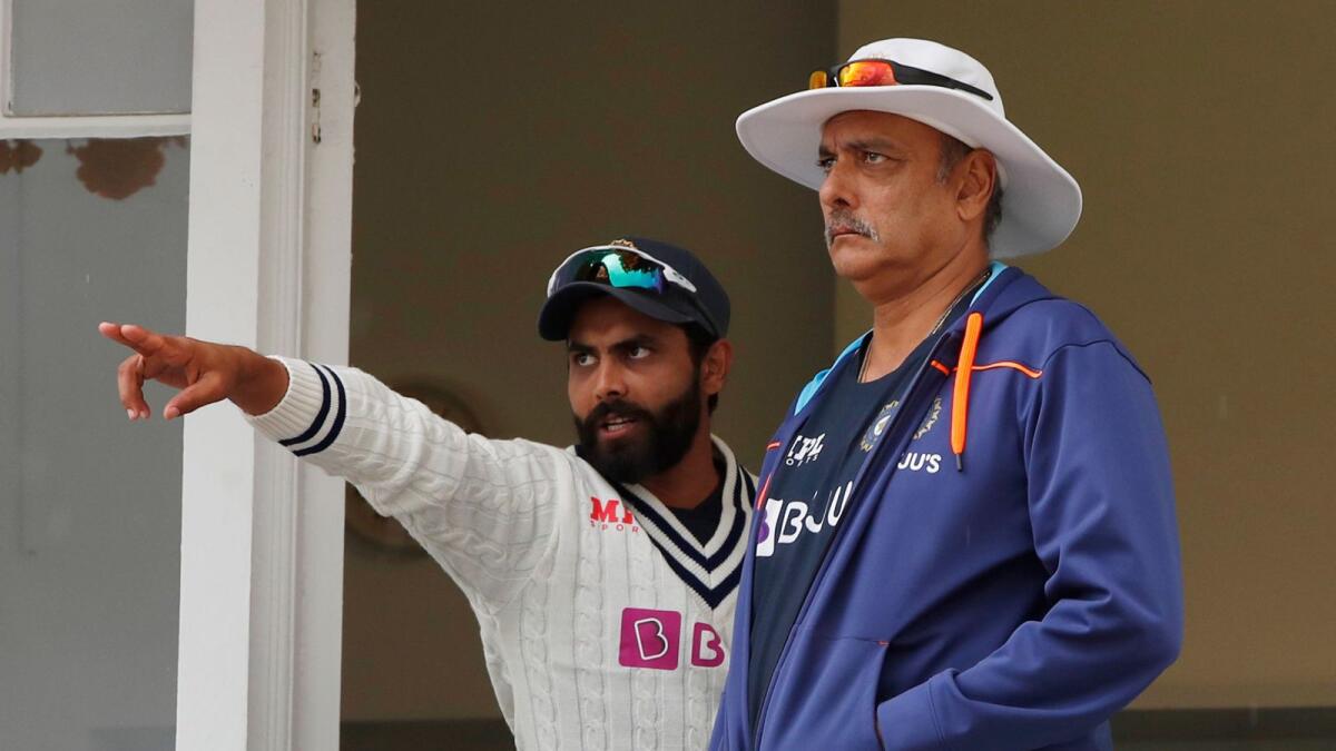 India head coach Ravi Shastri and Ravindra Jadeja during the last day of the first Test. — Reuters