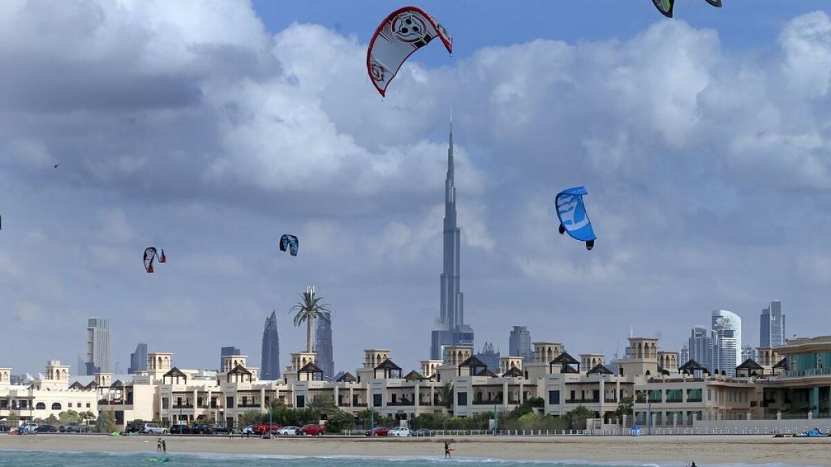Kite surfers enjoys a windy day at the Kite Beach in Dubai. — File photo