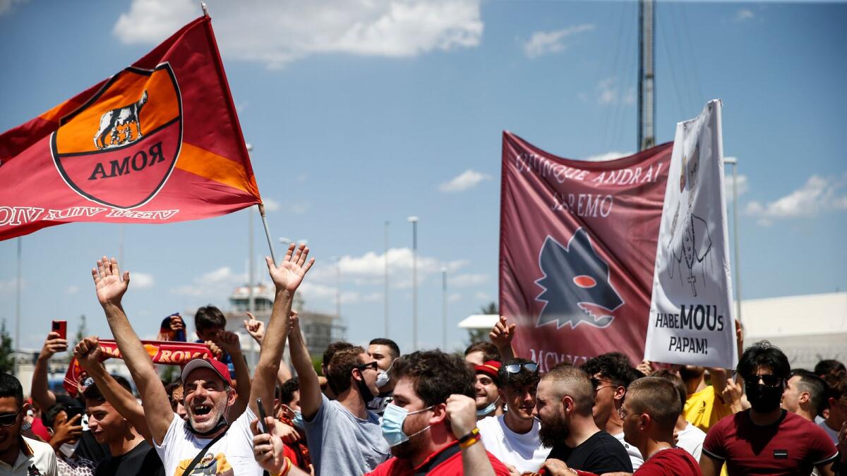 AS Roma fans at Ciampino airport to welcome Jose Murinho. — Reuters