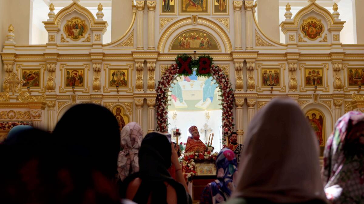 Priest Alexander Zarkesher leads Easter services at the Russian Orthodox Church in Sharjah. — AP