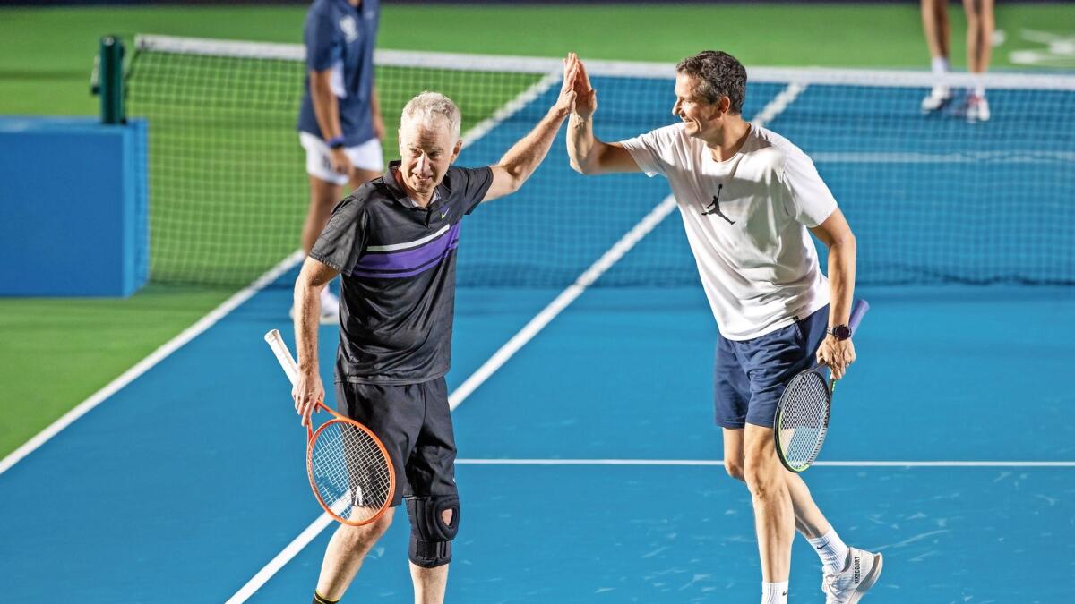 Turning back the clock: John McEnroe (left) and Richard Krajicek in action against Mark Philippoussis and Greg Rusedski. — Expo 2020 Dubai