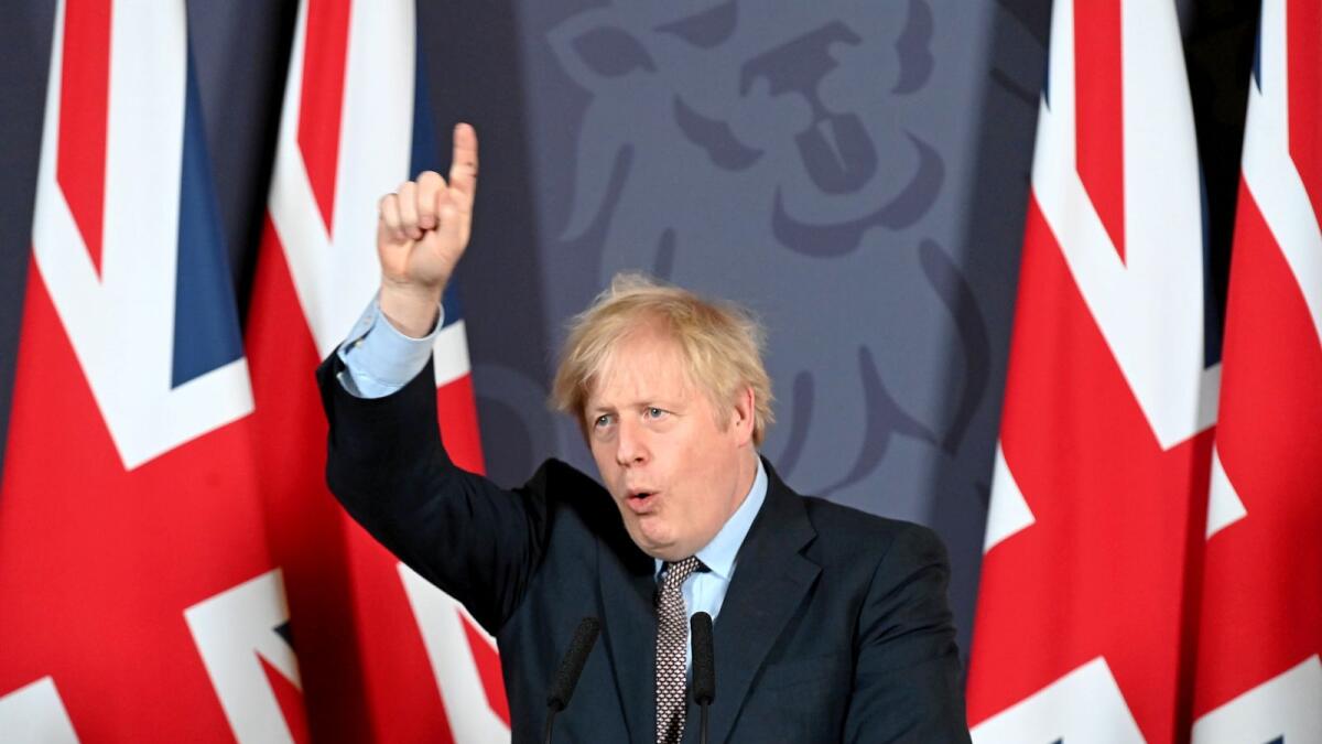 British Prime Minister Boris Johnson holds a news conference in Downing Street on the outcome of the Brexit negotiations, in London, Britain December 24, 2020.