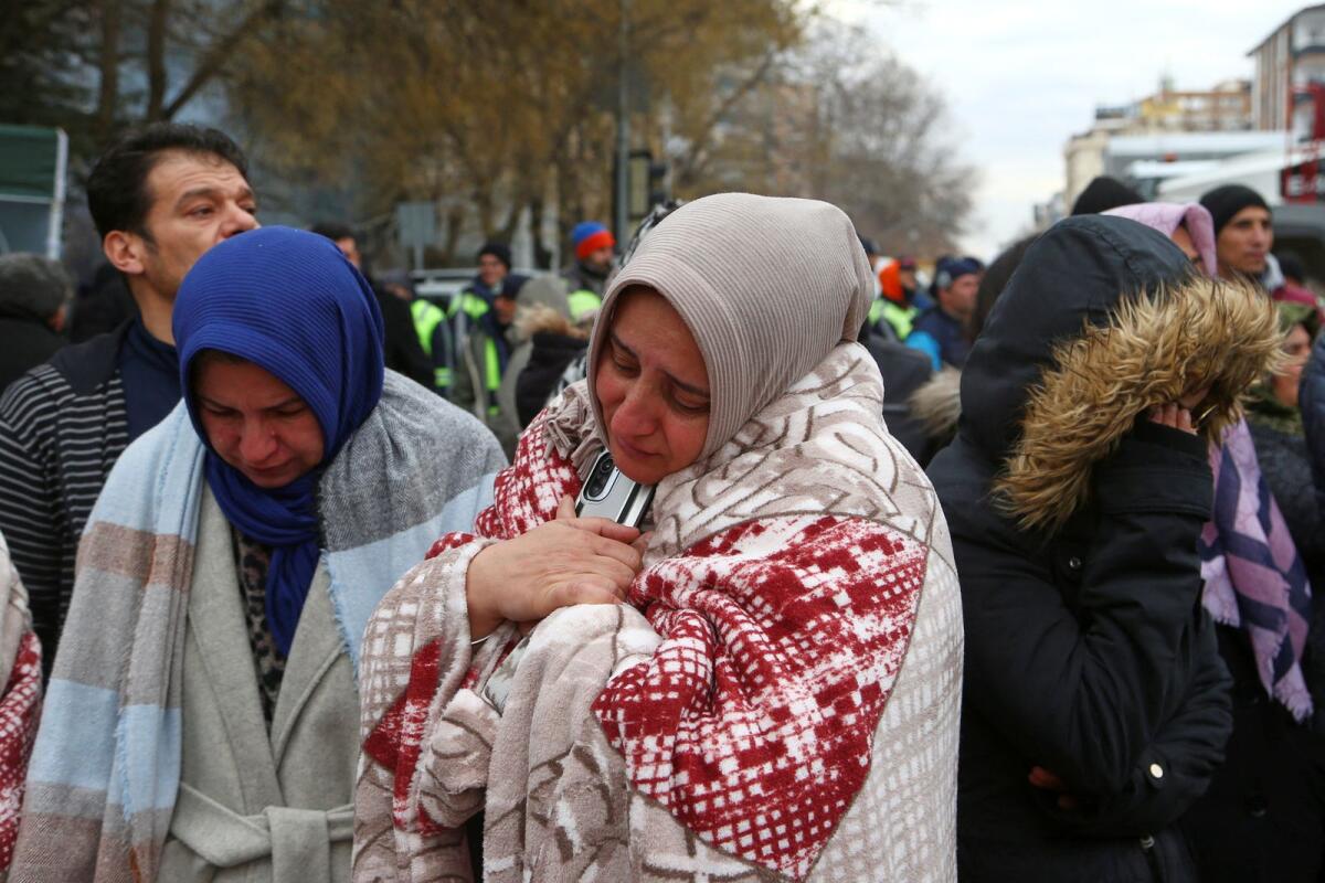 People react they wait near a search and rescue operation following an earthquake in Gaziantep, Turkey February 7, 2023. Photo: Reuters