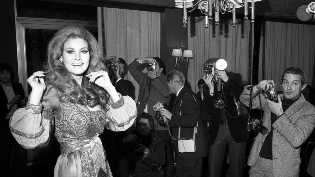 Raquel Welch poses for photographers in Paris on Jan. 15, 1970