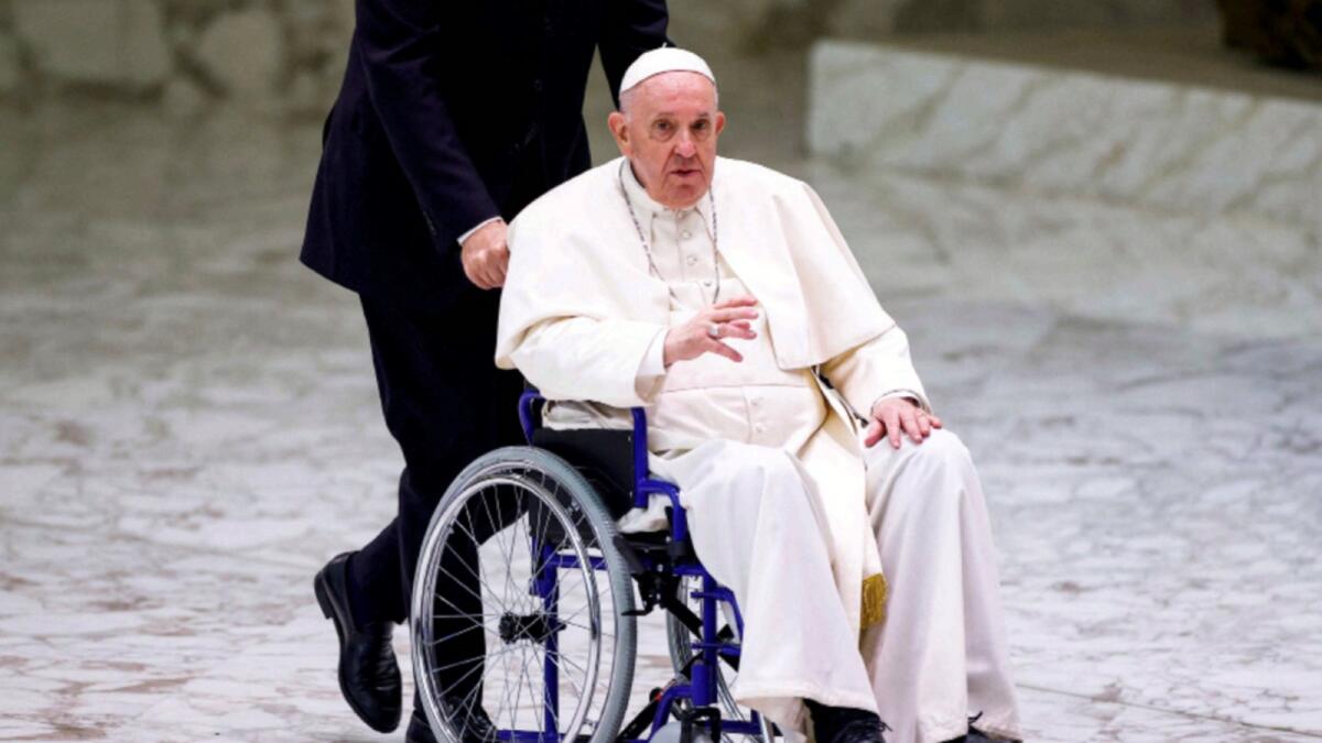 Pope Francis arrives on a wheelchair to meet with participants in the plenary assembly of the International Union of Superiors General (IUSG) at the Vatican. — Reuters