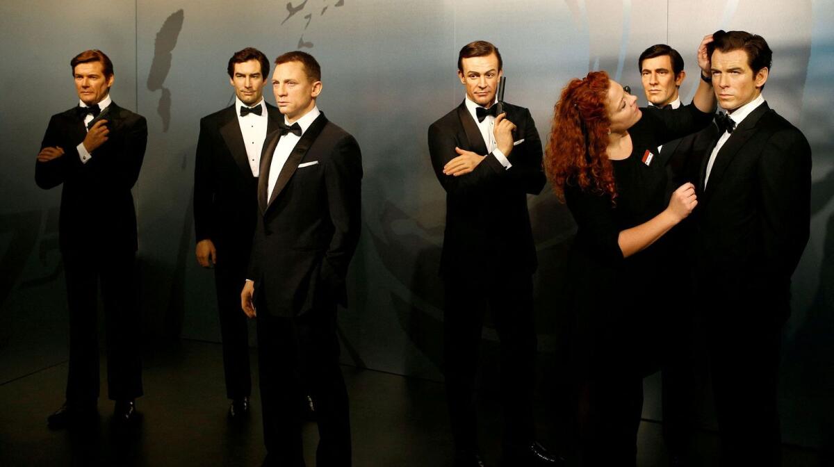 Wax figures of six of the actors who have portrayed James Bond. Photo: Reuters
